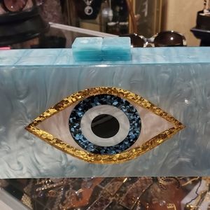 Baby blue evil eye clutch